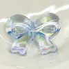 Fantasía de Verano Acrílico UV Hielo Transparente Pajarita Qq Agujero Recto Cadena para Teléfono Móvil DIY Accesorios para el Cabello Material de Colgante Joyería