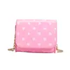 Elegante bolso de cadena de lunares para niños y niñas, bolso cruzado mini compacto con solapa para bebé, nuevo accesorio de moda infantil