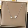 Collar de acero de titanio nuevo de moda 2023 para mujer estilo frío ins nicho de alta calidad lujo ligero combinable cadena para clavícula moda