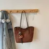 Bolsa Casual Retro Grande Capacidade 2026 Nova Outono Versátil Feminina de Ombro Passeio Trabalho Bolsa Tote Tendência