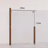 Estante de ropa de acero inoxidable montado en la pared para tienda de ropa, estante vintage color veta de madera de nogal, exhibidor de piso para ropa de mujer
