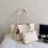 Bolsa de ombro tote vintage transfronteiriça para mulheres, grande capacidade, novo estilo inverno 2026, conjunto versátil de bolsas de mão
