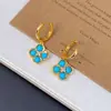 Aretes colgantes de trébol de cuatro hojas turquesa azul, nuevo diseño retro, estilo nicho, aretes de lujo ligeros, accesorios elegantes y versátiles