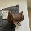 A bolsa de trabalho popular deste ano para mulheres 2026 Verão Nova Elegante Color Block Bolsa de Ombro Único Versátil para o Dia a Dia Bolsa Transversal