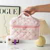 Nueva bolsa de cosméticos a cuadros original, nueva bolsa de almacenamiento portátil de gran capacidad y alto valor, bolsa de viaje para mujer.