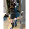 Falda Corta de Cuero PU Estilo Moderno para Viajar Petite de Cintura Alta que Cubre la Cadera Adelgazante Temperamento MQ2004