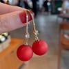 Pendientes de lazo de terciopelo rojo con ambiente de moda, temperamento femenino, flor dulce, borla larga, pendientes Joker al por mayor