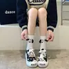 Calcetines de dibujos animados súper lindos ins de moda combinan con todo nicho orejas tridimensionales perro blanco y negro calcetines de algodón calcetines blancos de media caña calcetines para mujer