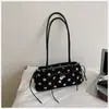Bolso de axila de lunares estilo coreano, nicho súper popular para mujer, nuevo modelo otoño 2026, bolso de hombro exquisito y elegante, versátil para el trabajo