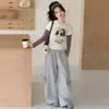 Conjunto de Camiseta Base Rayada de Dibujos Animados para Niñas 2026 Primavera y Otoño Nuevo Conjunto de Dos Piezas de Moda con Camiseta Falsa de Dos Piezas y Pantalones de Pierna Ancha