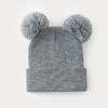 Gorro de punto lindo con pompón de lana personalizado transfronterizo para otoño e invierno, estilo coreano ins, color liso, doble pompón de lana, gorro de lana versátil