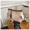Bolsa Versátil da Moda de Grande Capacidade para Deslocamento 2025 Outono Nova Bolsa de Ombro Axilar Bolsa Transversal Simples Feminina