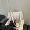 Moda de Verano 2026 Nuevo Bolso de Hombro Versátil Elegante Diseño de Nicho Simple Tejido de Alta Calidad
