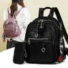 Mochila de Comércio Exterior para Mulheres 2025 Nova Moda Retrô Mochila para Sogras Mochila Escolar Estudantil Multifuncional Mochila Estilo Punk