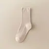 Calcetines de mujer de nueva temporada Primavera/Verano, calcetines de canalé de doble aguja, calcetines de mujer de color liso hasta la mitad de la pantorrilla, calcetines jk negros y blancos