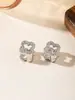 Anillo de Cadena Sencillo Estilo Nuevo Bicolor Oro y Plata Flor de Cuatro Hojas con Pedrería para Mujer, Versátil y Elegante, en Stock para Entrega Rápida, Suministro Transfronterizo