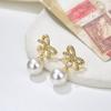 Pendientes de perlas con lazo para mujer, 2022, nuevos, de moda, ligeros, de lujo, con diseño de nicho, con un sentido avanzado.