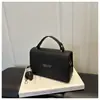 Bolso de mano de alta gama para mujer 2026 nuevo bolso cuadrado pequeño versátil elegante simple bolso de hombro cruzado bolso de mujer exquisito de moda