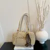 Bolso de mujer de alta gama 2026 nuevo de moda otoño nicho exquisito bolso de hombro axila bolso de trabajo de moda para el día a día