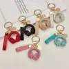 Llavero de Audífonos con Pedrería de Cristal Llavero Musical Completamente Cubierto de Pedrería Adorno Colgante de Cuerda de Diamante para Bolso Accesorios Llavero de Coche