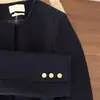 Elegante chaqueta corta azul marino para mujer, perfecta para otoño e invierno, con un diseño chic de inspiración francesa y cuello redondo, adecuada para primavera y otoño