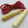 Fabricantes suministran cuerda de saltar individual de algodón y caucho hueca con mango de madera para niños y estudiantes, 2.5 metros