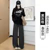Pantalones casuales de cuadros negros y grises para mujer 2026 otoño e invierno nuevo estilo caída baja estatura lana franela holgados rectos de pierna ancha