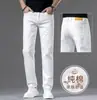Roupas Masculinas Populares / Jeans Branco de Algodão Puro de Alta Qualidade para Homens, Novas Calças Retas Elásticas para Primavera e Outono