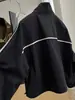 Elegante chaqueta para mujer que te hace lucir más delgada y alta, adecuada para figuras petite, cortavientos casual con cuello alto para otoño 2026, versátil y adelgazante
