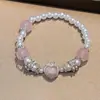 Pulsera de perlas nicho alto sentido temperamento dulce chica personalidad pulsera mayoreo 2024 nueva joyería red
