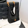 Bolso de mujer estilo casual 2026 nuevo verano súper popular tejido para vacaciones bandolera bolsa de mano para ir al trabajo de gran capacidad