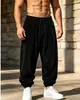 Pantalones jogger de pana para hombre europeos y americanos, pantalones tipo harén holgados con cordón para otoño e invierno, pantalones casuales retro de caída ancha para hombre