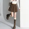 Falda plisada de lana retro para mujer, nuevo diseño de otoño e invierno, versátil de cintura alta, adelgazante, línea A, falda corta anti-exposición A1416