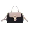 Bolsas Femininas da Moda para Exportação Outono/Inverno 2026 Novas Bolsas Color Block Fashion, Bolsas de Ombro e Transversais Versáteis de Nicho para Mulheres