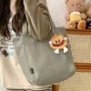 Bolso de hombro casual simple estilo japonés inspirado en Ins para mujer, nuevo modelo 2024, bolsa de mano de gran capacidad, color liso para estudiantes