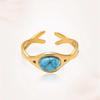 Anillo abierto de acero inoxidable turquesa para mujer, estilo europeo y americano, con diseño de mano de acero de titanio y diamantes retro transfronterizos.