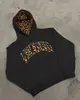 Venta al por mayor transfronteriza europea y americana: estampado de leopardo, bordado de letras, pantalones largos de estilo urbano casual, sudaderas con capucha y pantalones de chándal unisex