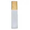 Botella Roller de Vidrio Esmerilado con Cubierta Efecto Madera al por Mayor Subbotella de Perfume Aceite Esencial Botella Roller Masajeador de Gama Alta