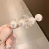 Grampo Bico de Pato com Laço de Pérola 2026 Novo Estilo Presilha de Cabelo Exquisita Versátil Grampo de Cabelo para Testa Acessório de Cabelo para Mulheres