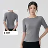 Camiseta fitness feminina Amazon de manga curta, gola redonda, corte justo, camiseta de yoga, top esportivo de manga três quartos para Pilates
