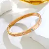 Pulsera de Acero de Titanio Ins Ojo del Diablo Celebridad de Internet Kajia No se Desvanece Elegante de Nicho Pulsera Chapada al Vacío en Oro de 18 Quilates para Mujer