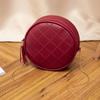 Bolso de moda para mujer, novedad de 2023, pequeño bolso redondo con relieve de diamantes, bandolera con borlas y cremallera.