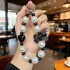 Fabricante Mayorista de Llaveros Transfronterizos con Cuentas de Moño, Llaveros para Coche de Niñas Temática Dopamina, Cordones para Teléfono con Forma de Corazón