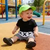 Ropa para niños Versión coreana de pantalones cortos para niños Tide fan ropa de verano pantalones de pp de cactus pantalones de rayas de bebé una generación de cabello