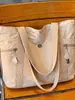 Nova bolsa tote simples de grande capacidade transfronteiriça, bolsa de mão casual e moderna, bolsa de ombro versátil para trabalho e deslocamento