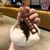 Suerte Colgante de Peluche de Caqui Llavero Adorno Caqui Suerte Colgante para Coche Adorno de Piel Sintética de Conejo Regalo