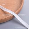 En existencia Banda elástica desechable blanca Ropa protectora Cinta de borde de bloqueo Cinta de goma plana Cinta Cinta para caminar