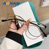 Gafas de comercio exterior con montura metálica nueva, antirradiación de rayos azules, montura retro de ojo de gato, artefacto de belleza simple, gafas sencillas para hombres y mujeres