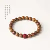 Pulsera de la serie Sándalo con diseño simple y elegante, con cuentas superiores de flor de loto de arena dorada púrpura, adecuada para hombres y mujeres, pulsera de pareja, cuentas budistas y accesorio cultural