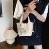 Bolso Cubo Cesta de Moda y Estilo para Mujer 2025 Nuevo Elegante Color Sólido Moda Nicho Hombro Único Cruzado Bolso de Moda